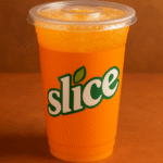 Image of Orange Slice in a togo cup.