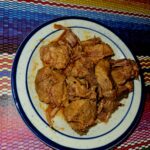 This is an image of pork filling at Manuel's Taco Hut.