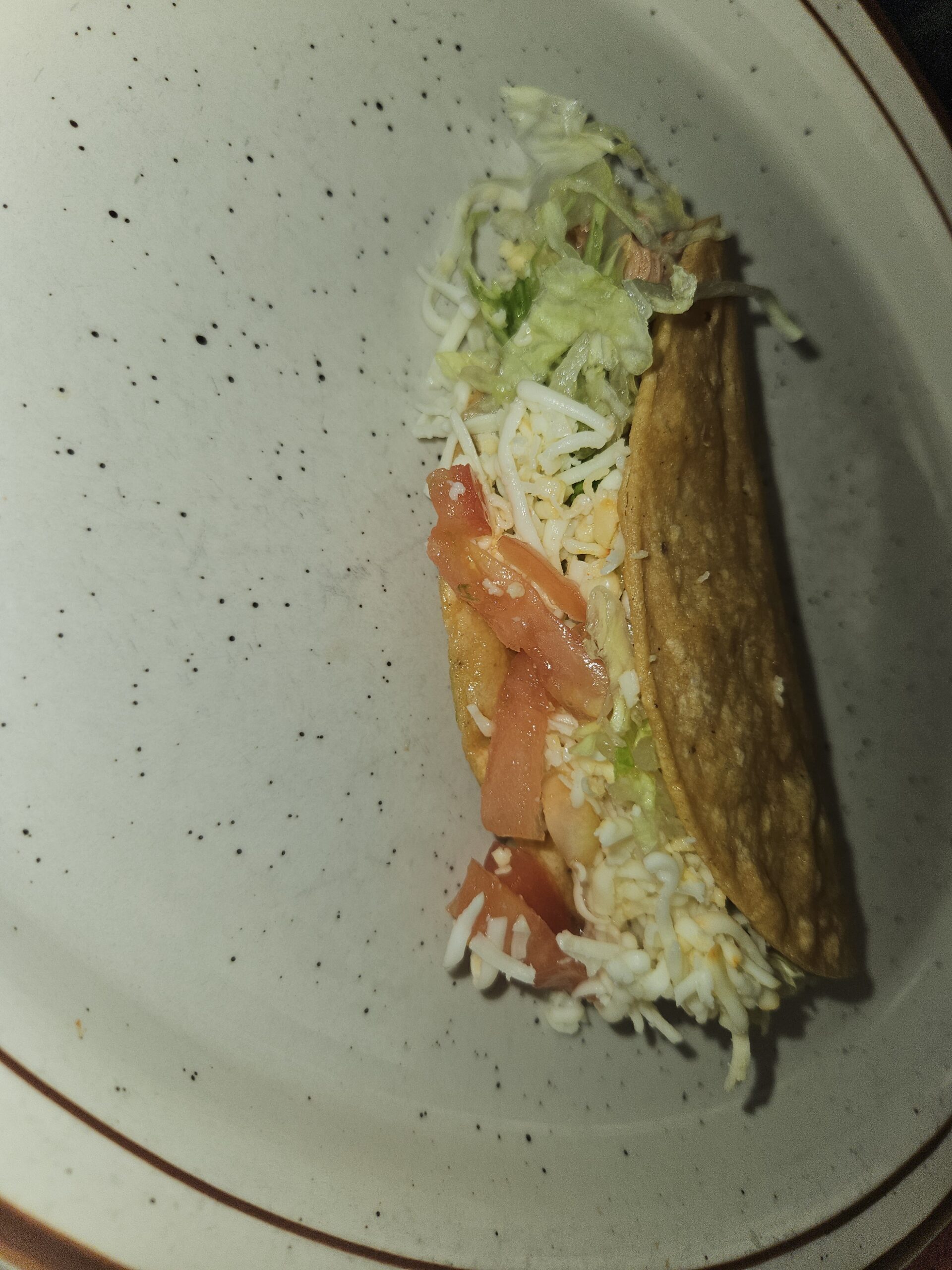 This is an image of a hard taco at Manuel's Taco Hut.